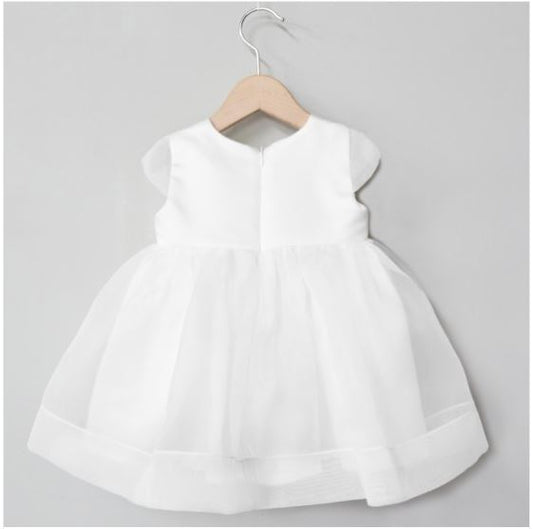 Cream dress with organdy bow