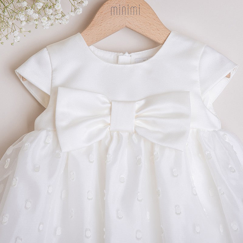 Cream dress with embroidered dots