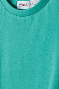 Green sleeveless t-shirt with knot