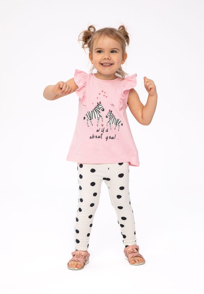 Pink t-shirt with zebra print & white polka dot leggings