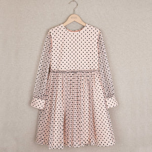 Peach tulle dress with black polka dots
