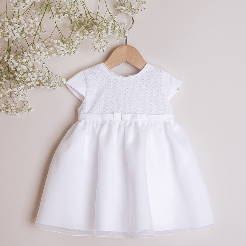 White dress with embroidered material