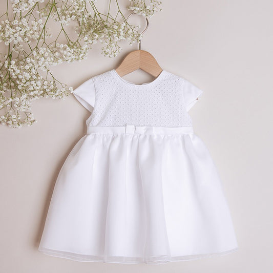 White dress with embroidered material