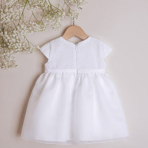 White dress with embroidered material