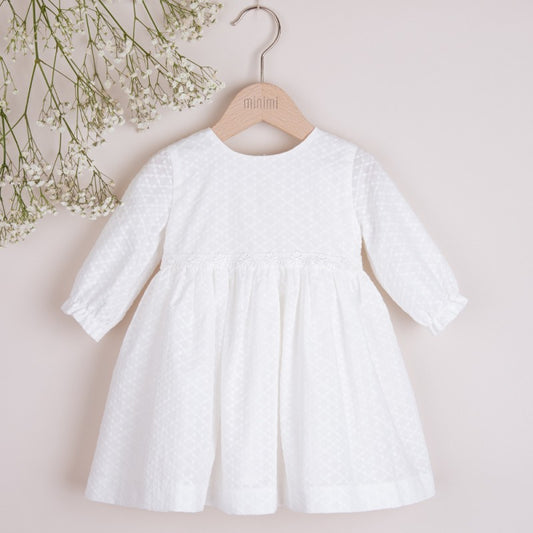 Cotton dress with delicate embroidery and long sleeves
